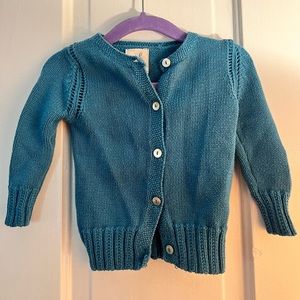 Turquoise knit cardigan, perfect for your baby